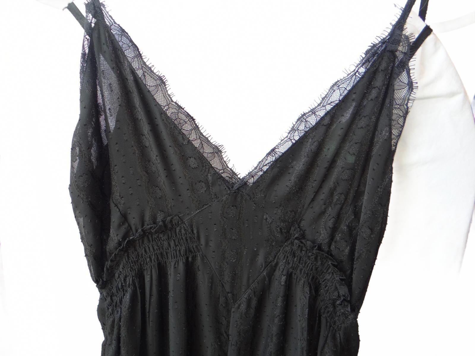 Elegant Black Lace-Trimmed Jumpsuit - size 4