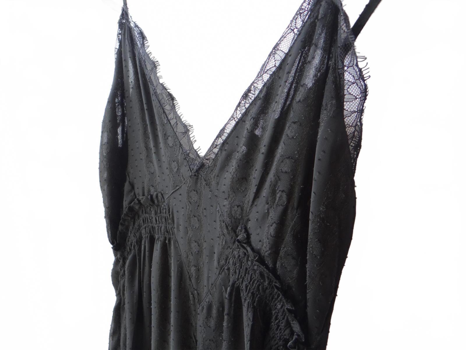 Elegant Black Lace-Trimmed Jumpsuit - size 4